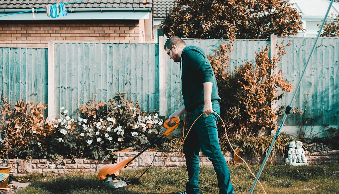 Outdoor tradesperson working in a garden